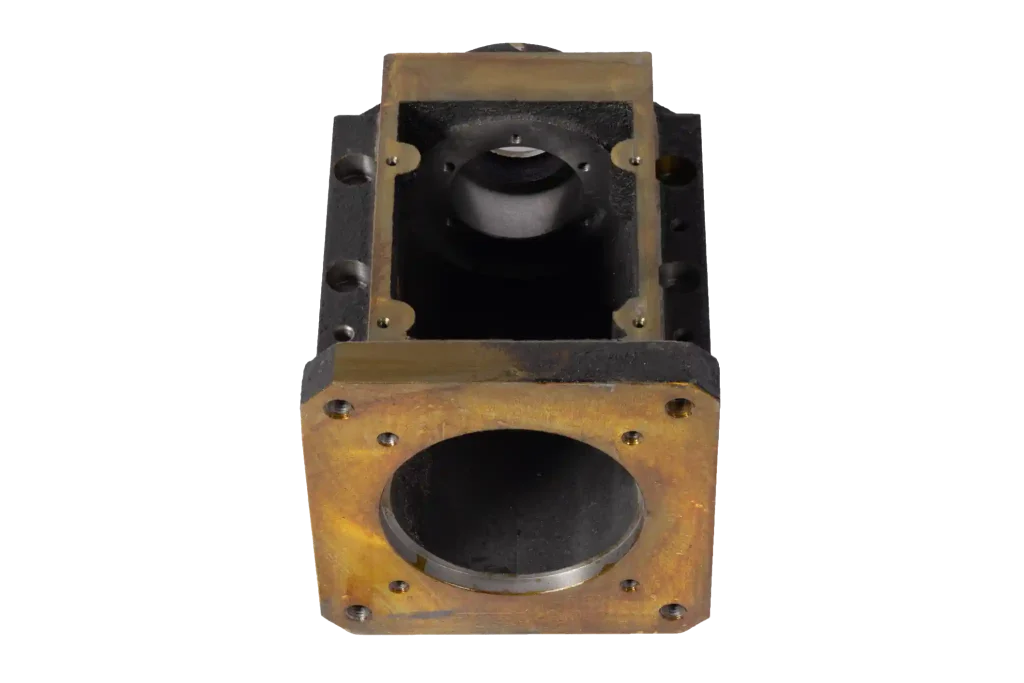 Cast iron gearbox housing casting with machined openings and bolt-hole pattern