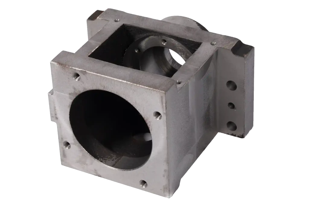 Agricultural machinery cast mounting block with machined bore and structural side support