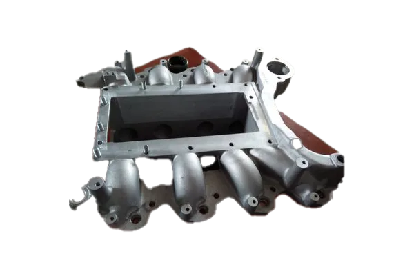 Gravity die cast intake manifold with machined mounting surfaces and multiple runner ports