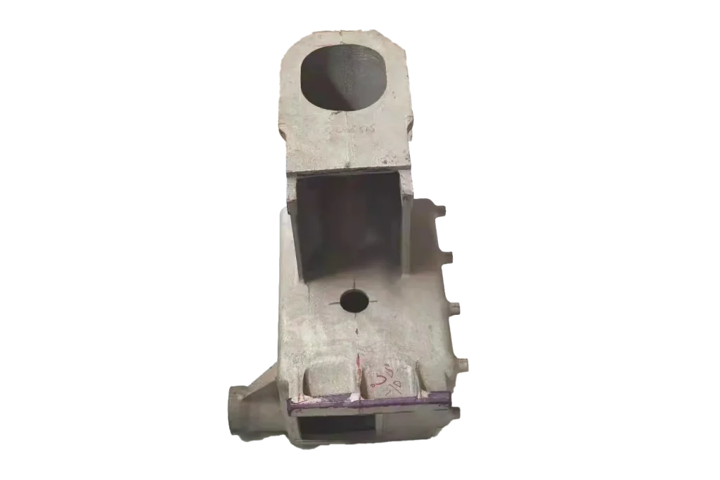 Small gravity die cast part with machined hole and flat mounting surfaces