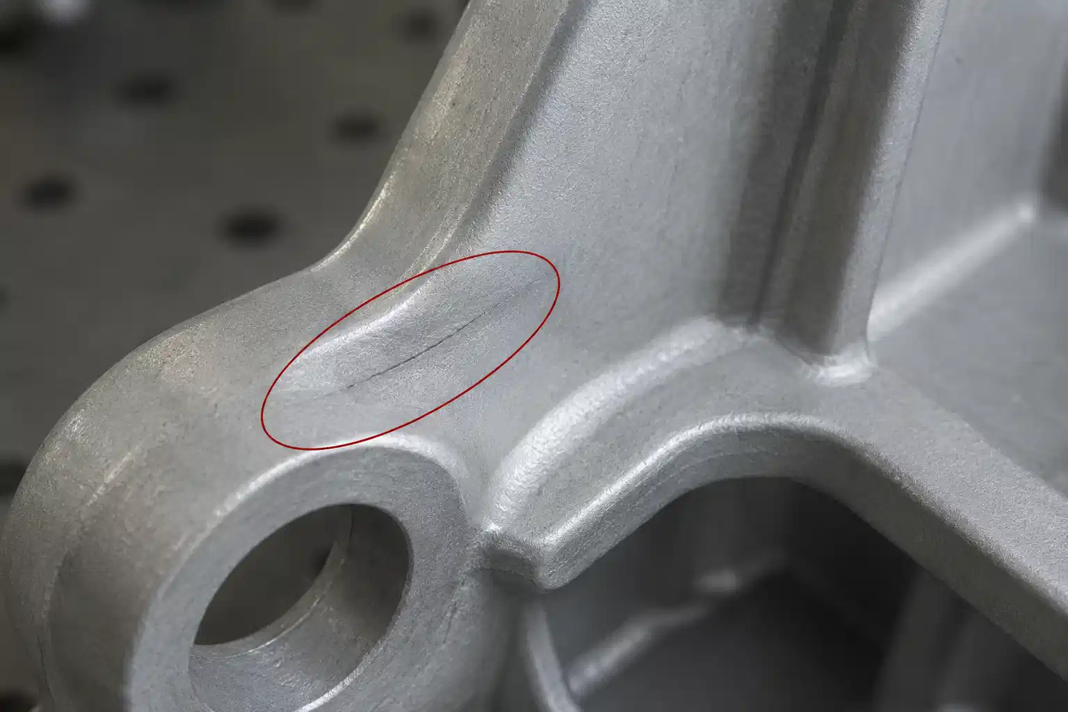 Close-up of a cold shut defect on an aluminum die casting part