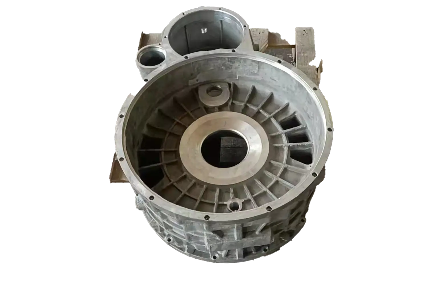 Gravity casting housing component with machined surfaces and ribbed structure
