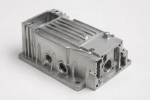 ADC12 aluminum alloy casting housing with ribs and machined mounting features