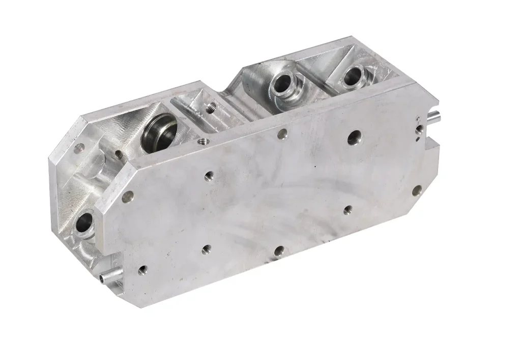 Aluminum equipment housing casting with machined surfaces and mounting holes