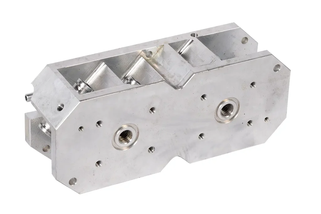 Internal view of aluminum equipment housing casting with machined cavities and support ribs