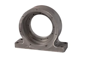 Cast pedestal bearing housing with machined bearing bore and mounting base