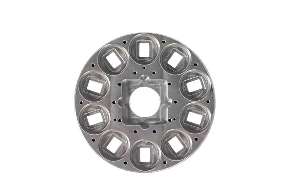Circular mounting flange casting with machined holes and raised mounting features