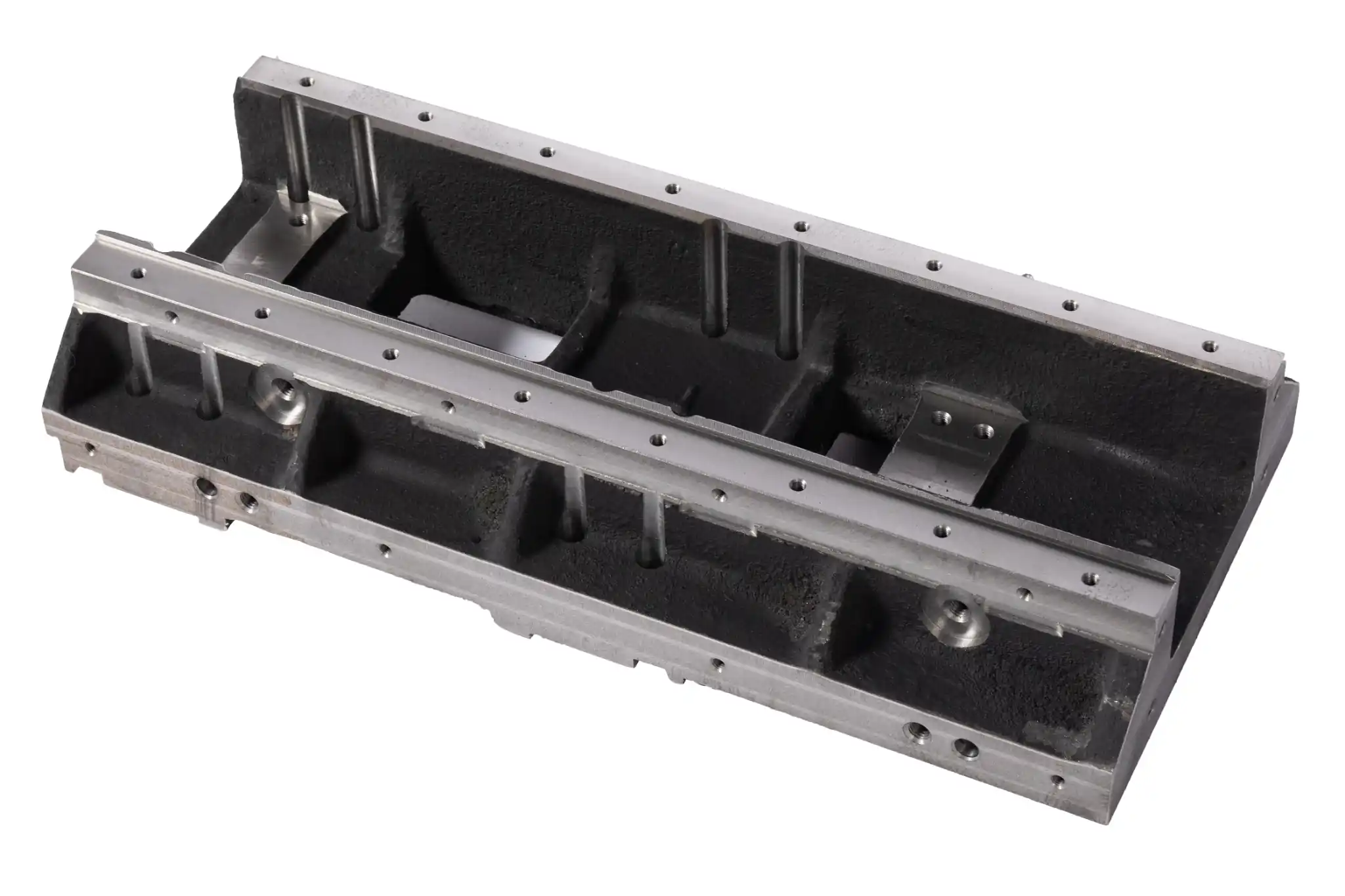 Industrial machine base frame with machined mounting surfaces and reinforcement ribs