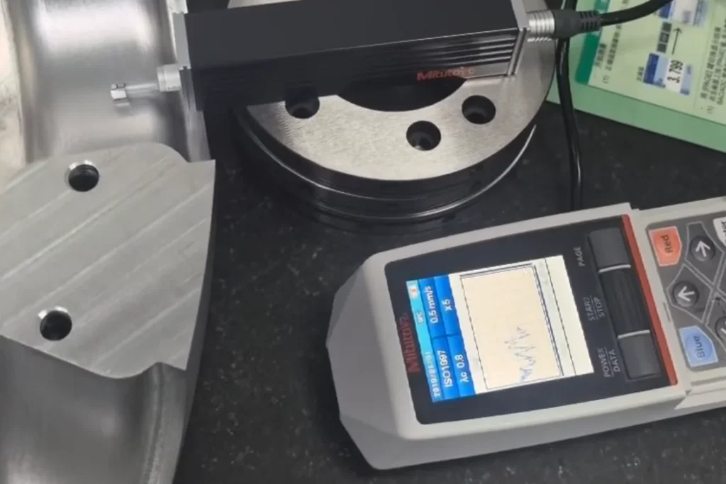 urface roughness tester measuring a machined casting