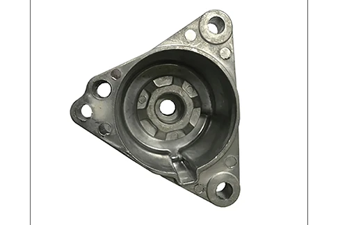 Triangular aluminum die cast housing with a central circular opening