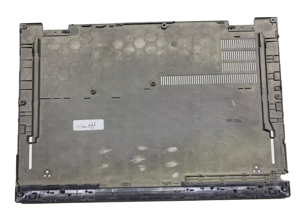 Thin-wall electronic device bottom housing with ventilation slots and integrated mounting features.